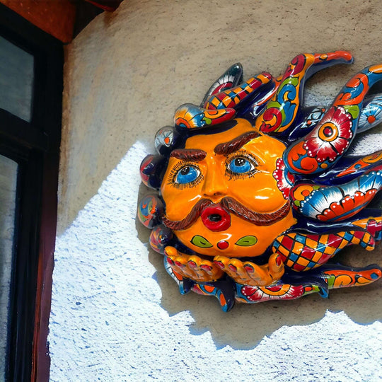 Handcrafted Talavera Sun Face | Colorful Mexican Wall Art — vibrant hand-painted Talavera sun face with mustache blowing a kiss, kiln-fired lead-free glaze