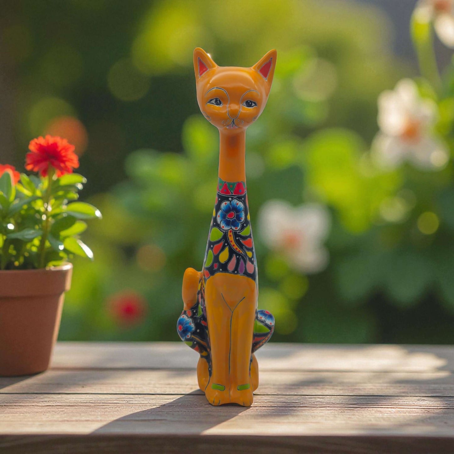 Colorful Talavera Cat Statue | Handcrafted Mexican Art - tall handcrafted Talavera cat with dark body and vivid hand-painted floral and geometric patterns