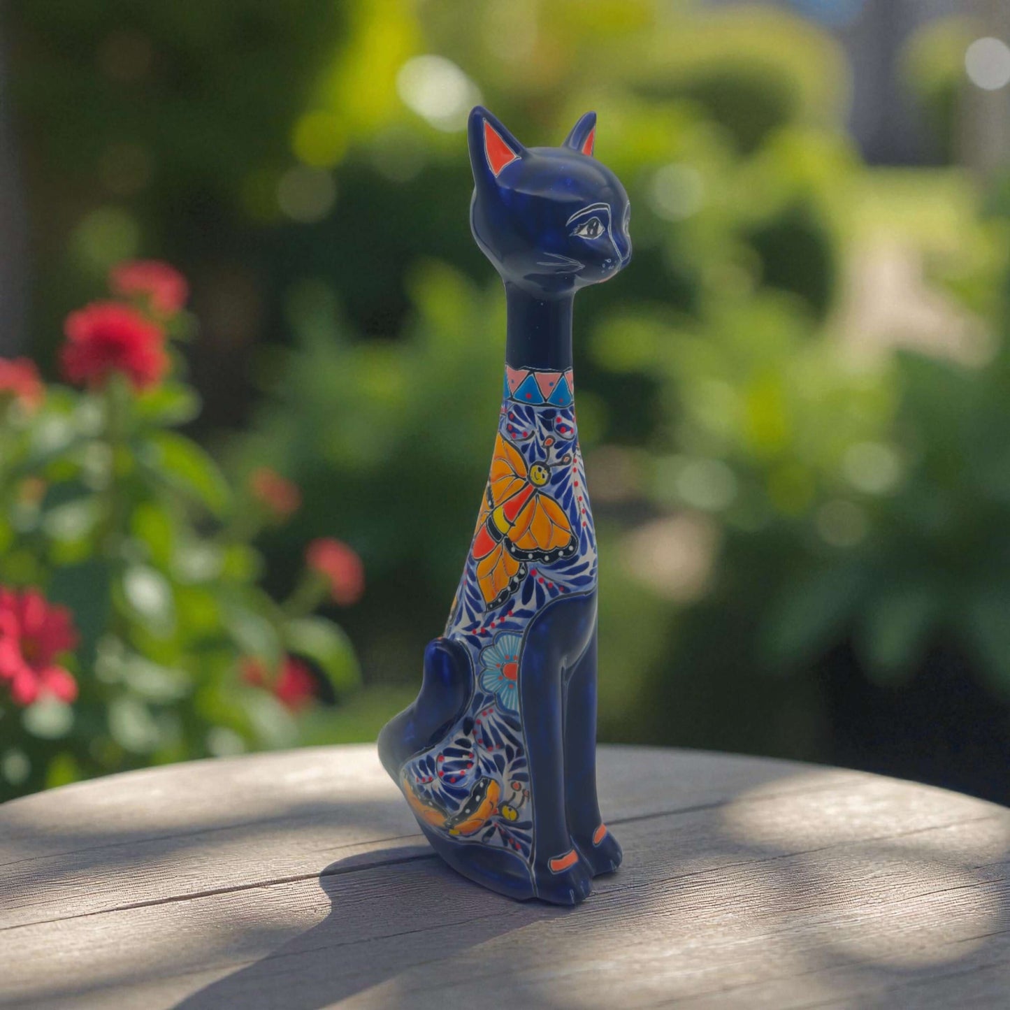 Colorful Talavera Cat Statue | Handcrafted Mexican Art - tall handcrafted talavera cat with dark body and vivid hand-painted floral and geometric patterns