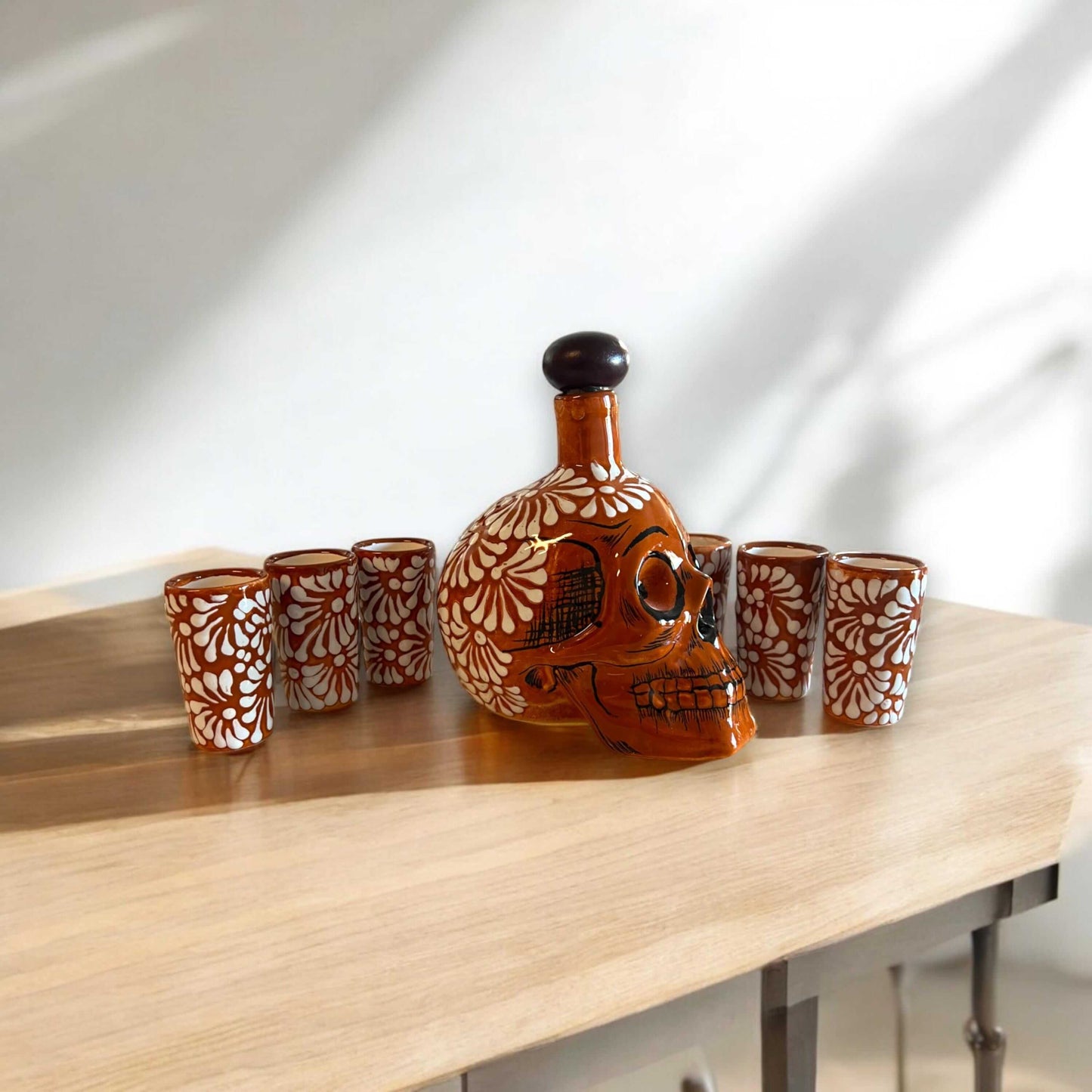 Handmade Skull Decanter Set | Brown & White Mexican Barware - hand-blown brown skull decanter with six matching white-accent shot glasses