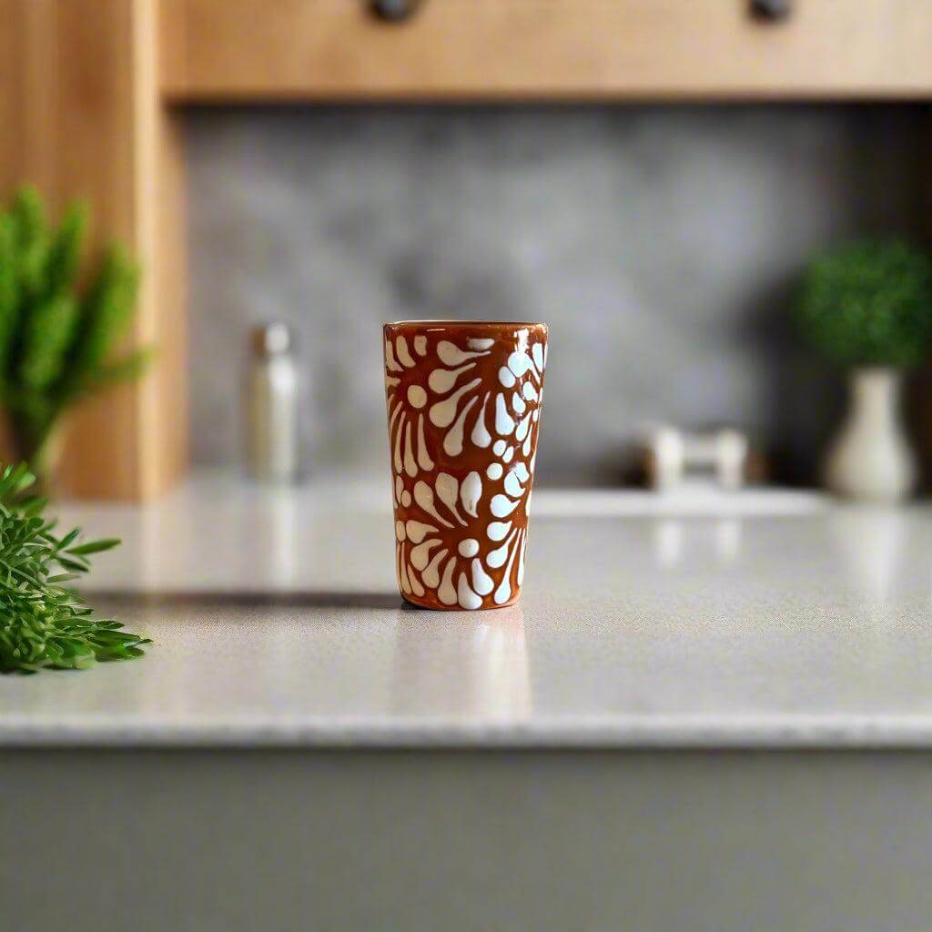 Handmade Skull Decanter Set | Brown & White Mexican Barware - brown and white hand-blown skull shot glass with Talavera-style pattern