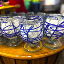 Mexican Artisan Shot Glass | Blue & White Cognac Style Design - handmade blue & white hand-blown glass shot glasses on wooden display