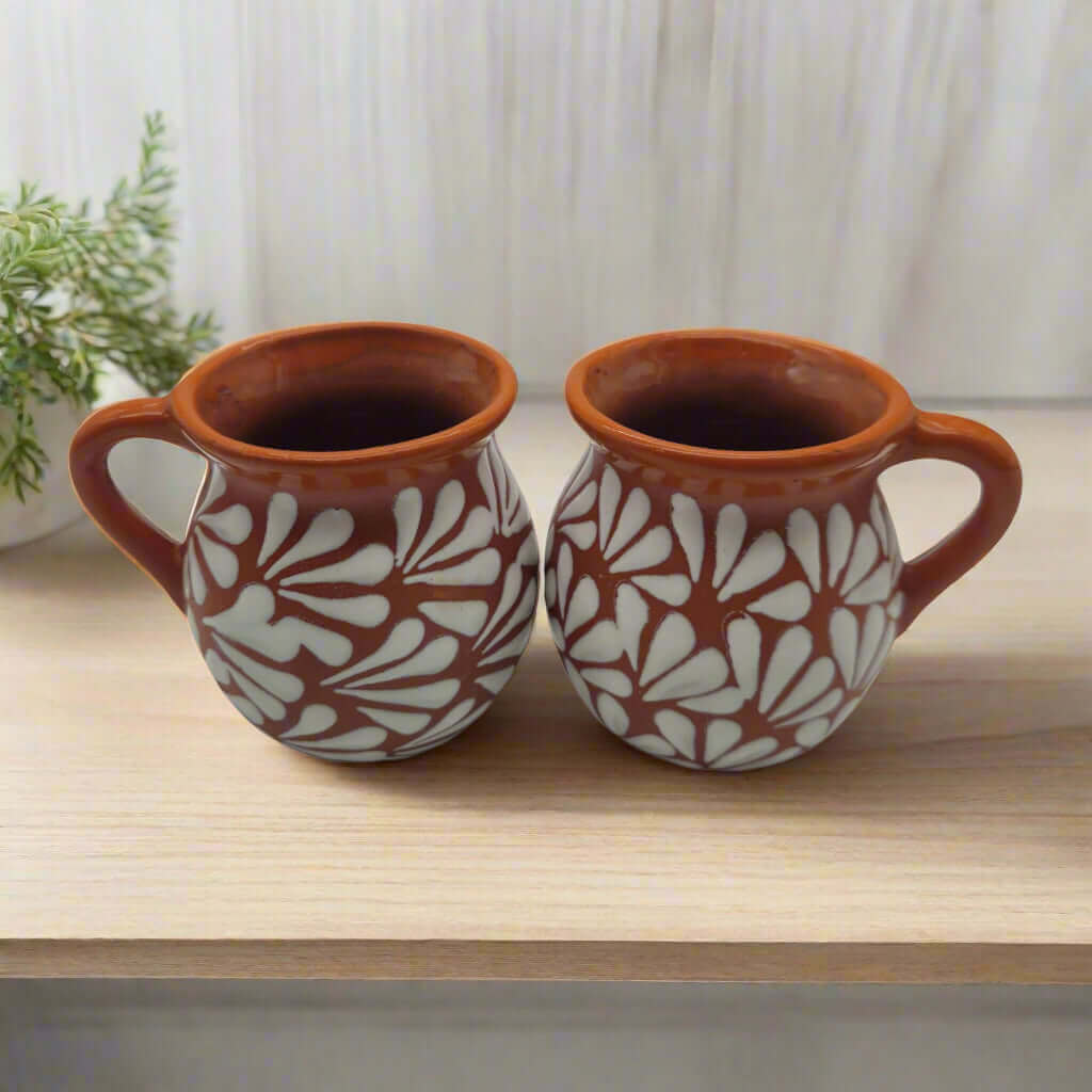 Mexican Clay Jarrito Mug | Handmade Brown Pottery Cup - pair of hand-painted brown clay mugs with white etched floral pattern, matte finish, Guanajuato craftsmanship