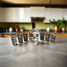 Handmade Skull Decanter Set | Black & White Mexican Barware — hand-blown skull decanter with six matching black and white shot glasses on kitchen counter
