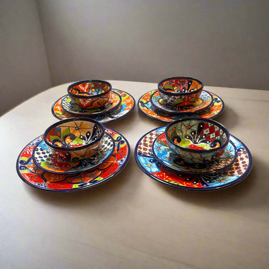 36-Piece Talavera Dinnerware Set | Handmade Mexican Plates & Bowls - hand-painted colorful Talavera plates and bowls arranged on table