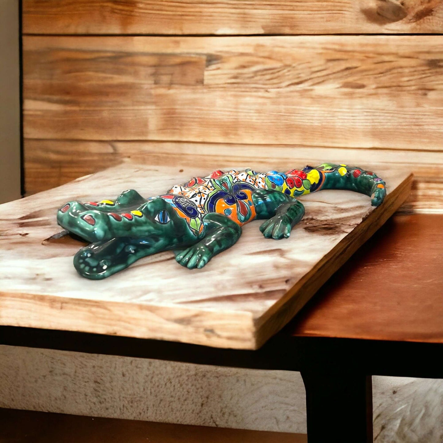 Vibrant Talavera Alligator | Large Mexican Handmade Ceramic Reptile Art - hand-painted Talavera alligator sculpture on wooden shelf