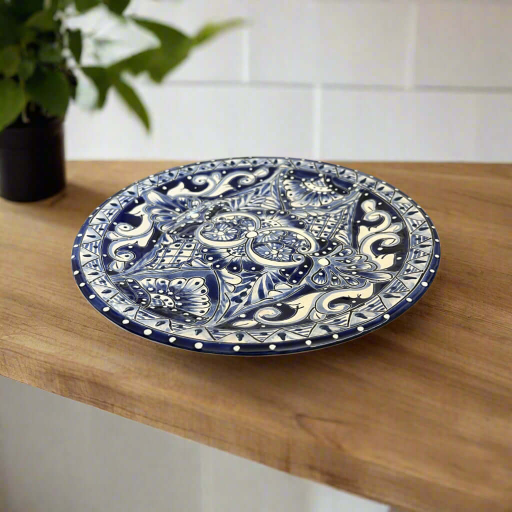 10" Talavera Blue & White Dinner Plate | Mexican Dinnerware - handmade blue and white Talavera ceramic plate on wood shelf