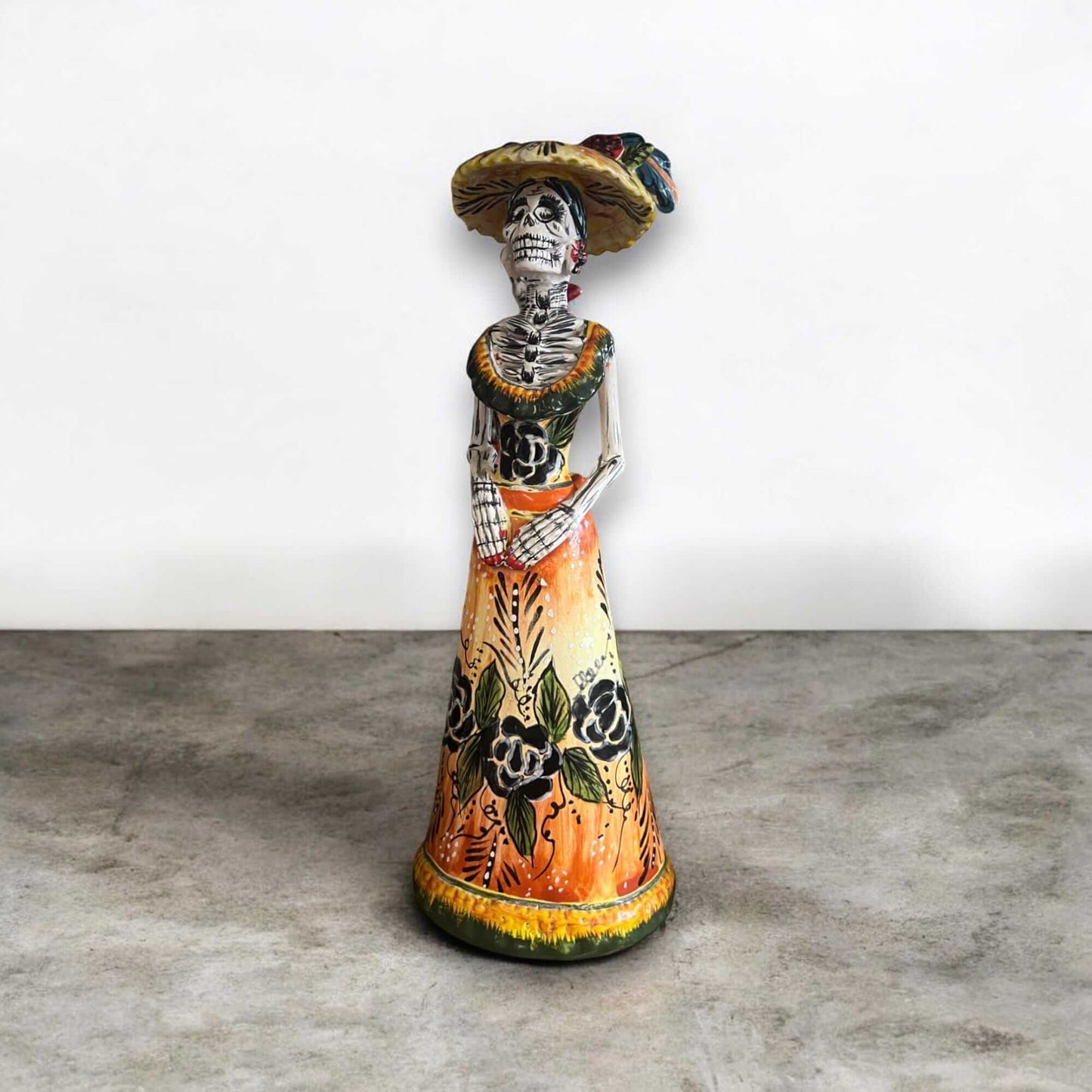 Talavera Catrina Figurine | Handmade Day of the Dead Skeleton Art - hand-painted Talavera La Catrina with floral dress and wide hat