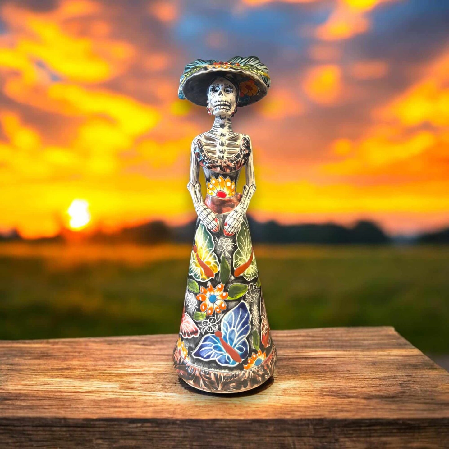Talavera Catrina Figurine | Handmade Day of the Dead Skeleton Art — hand-painted Talavera Catrina at sunset, Guanajuato kiln-fired decorative figurine