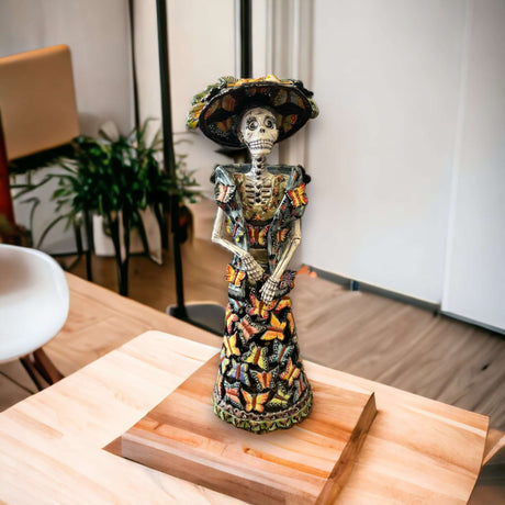 Handmade Talavera Day of the Dead Pottery | 27-Inch Tall Skeleton Woman hand-painted ceramic skeleton figurine on wood base