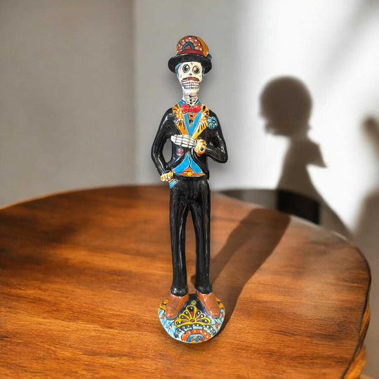 Talavera Day of the Dead Catrin | Handmade Wedding Skeleton Man hand-painted Talavera figurine in black suit on wooden table