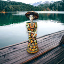Handmade Talavera Day of the Dead Pottery | 27-Inch Tall Skeleton Woman hand-painted ceramic figurine on lakeside dock