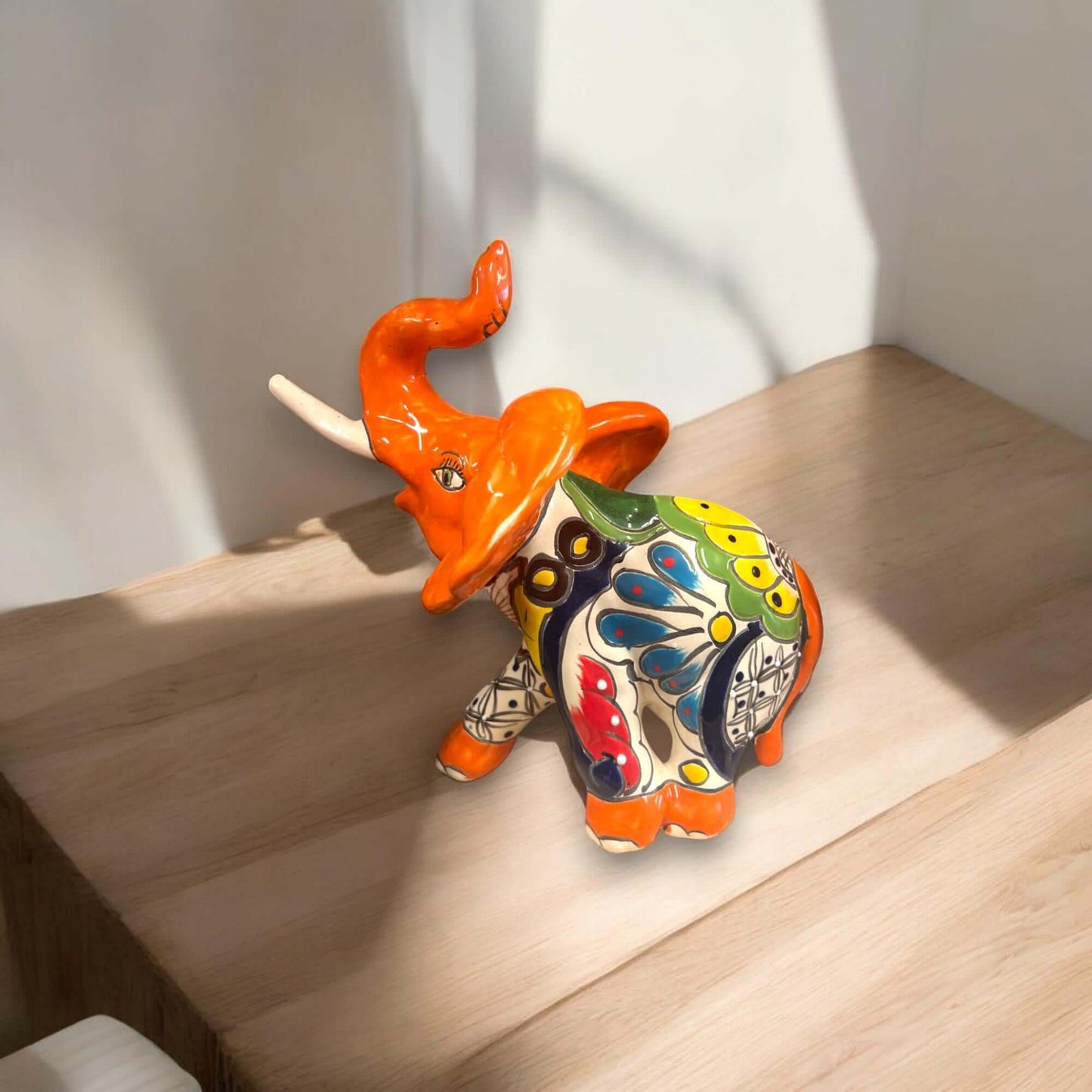 Talavera Elephant Statue | Handmade Mexican Ceramic Decor — hand-painted Talavera elephant in vivid blues, oranges, yellows and greens (lead-free glaze)