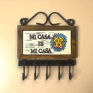 Talavera Key Holder | Handmade Mexican Wall Hook featuring hand-painted 'Mi Casa Es Mi Casa' tile, wood frame and five metal hooks