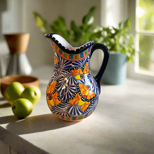 Handmade Talavera Pitcher | Mexican Ceramic Water Jug hand-painted blue and orange floral ceramic pitcher from Guanajuato, decorative and functional