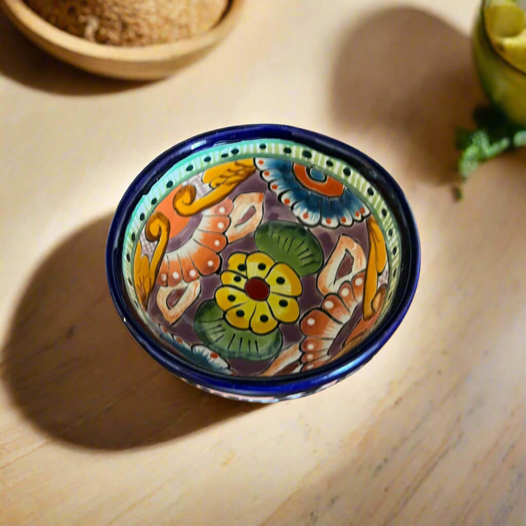 Talavera Salsa Bowl | Handmade Mexican Ceramic Sauce Dish - hand-painted three-legged Talavera bowl with cobalt rim and floral pattern