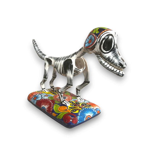 Colorful Talavera Skeleton Dog | Handmade Mexican Artistry - hand-painted Talavera skeletal dog statue on floral base