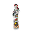 Talavera Skeleton Woman | Handmade Day of the Dead Pottery (Medium) - hand-painted Talavera skeleton woman figurine with floral dress and parrot