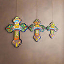 Set of 3 Talavera Wall Crosses | Handmade Mexican Ceramic Art - colorful hand-painted Talavera floral crosses hanging on a wall