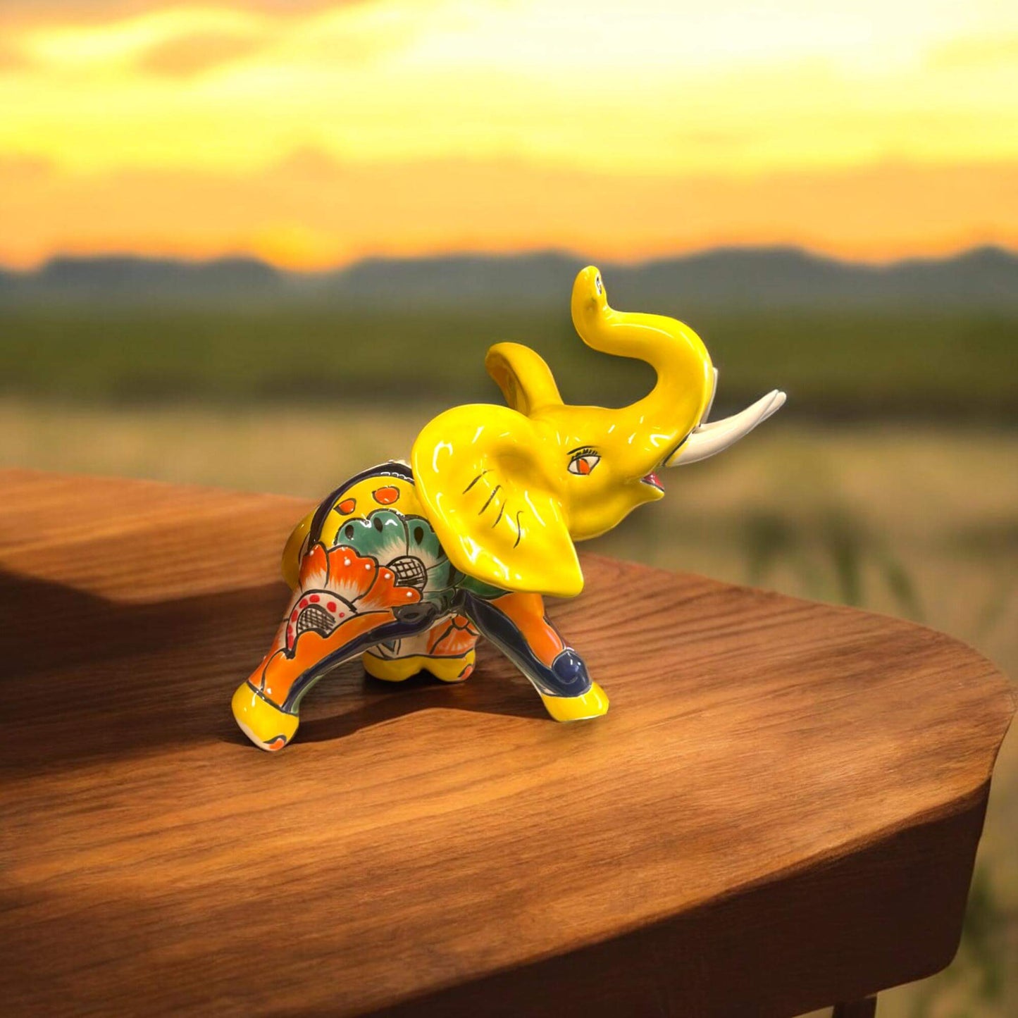 Talavera Elephant Statue | Handmade Mexican Ceramic Decor - hand-painted yellow Talavera elephant with floral patterns, kiln-fired lead-free glaze
