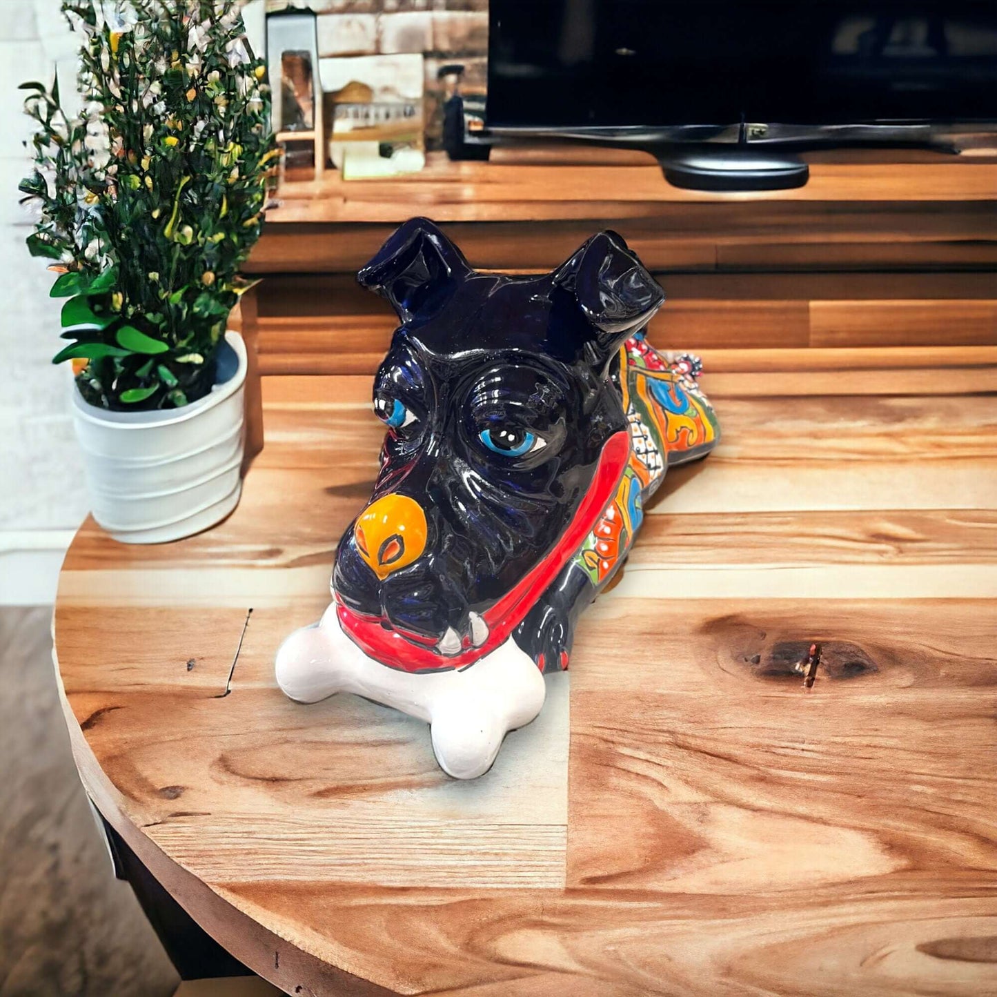 Handpainted Talavera Ceramic Large Laying Dog Decor with Bone - colorful Mexican ceramic dog figurine on wooden table