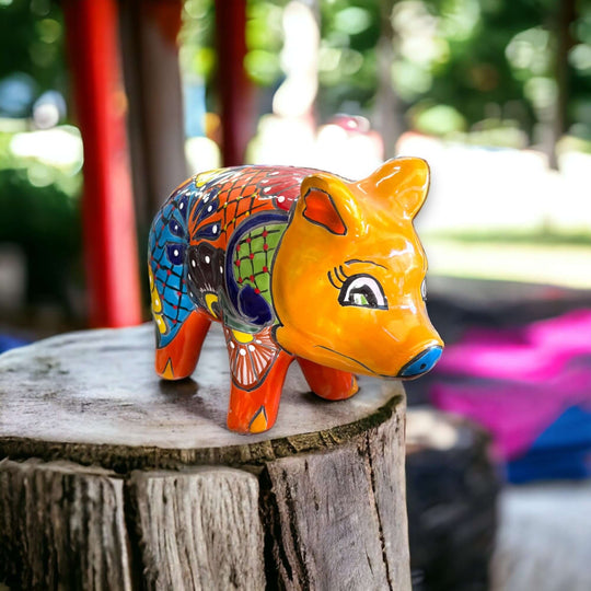 Vibrant Talavera Pig Statue | Colorful Handmade Mexican Animal Pottery (Medium) hand-painted Talavera pig statue on wooden stump, bright kiln-fired glaze