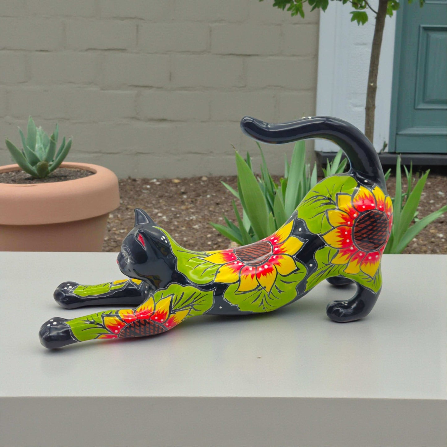 Talavera Stretching Cat Statue | Hand-Painted Sunflower Design - hand-painted Mexican folk art cat with bright sunflower pattern