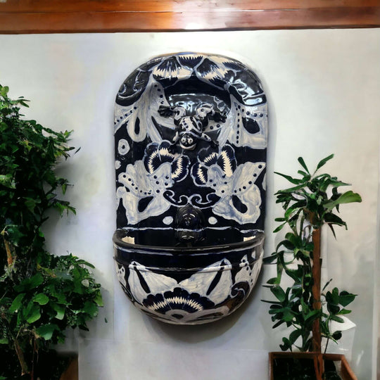 Talavera Wall Fountain | Handcrafted Mexican Ceramic Water Feature - black white floral hand-painted ceramic wall fountain mounted