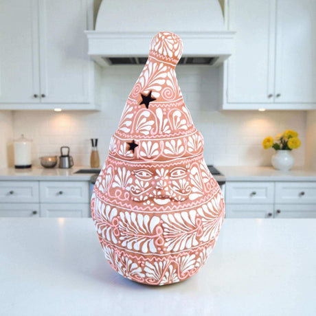 Terracotta Talavera Santa | Handcrafted Holiday Statue hand-painted terracotta Santa with white floral motifs and star cutouts, kiln-fired glaze