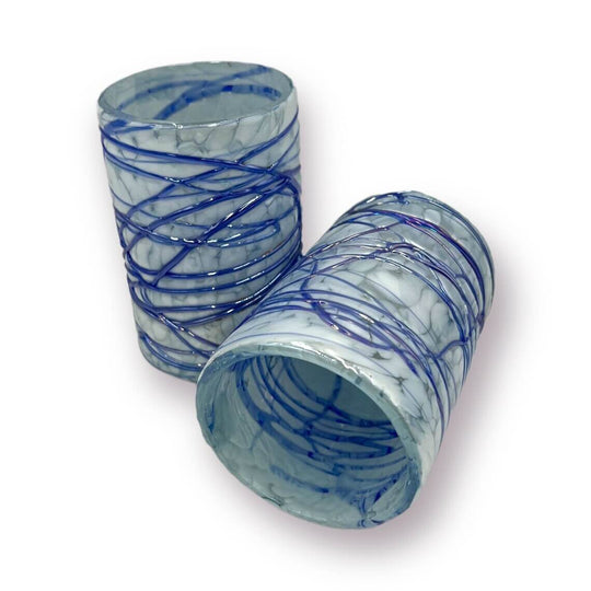 Mexican Hand Blown Drinking Glasses | White and Blue Artisan Glassware - pair of hand-blown white frosted glasses with cobalt swirls