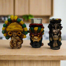 Handcrafted Mexican Shot Glass | Aztec Warrior Design - three colorful handcrafted Aztec warrior shot glasses on wooden counter, Guanajuato artisanal detail