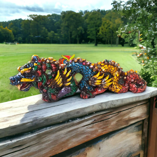 Handmade Aztec Dragon Statue | Cultural Art (Medium Size) - colorful handmade Aztec dragon statue on wooden railing, Guanajuato artisan craftsmanship