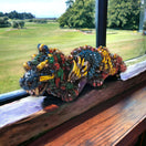 Handmade Aztec Dragon Statue | Cultural Art (Medium Size) colorful glazed ceramic dragon statue on windowsill with green landscape view