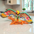 Majestic Talavera Eagle Figurine | Handcrafted Mexican Art hand-painted cobalt blue golden yellow terracotta eagle on textured log base