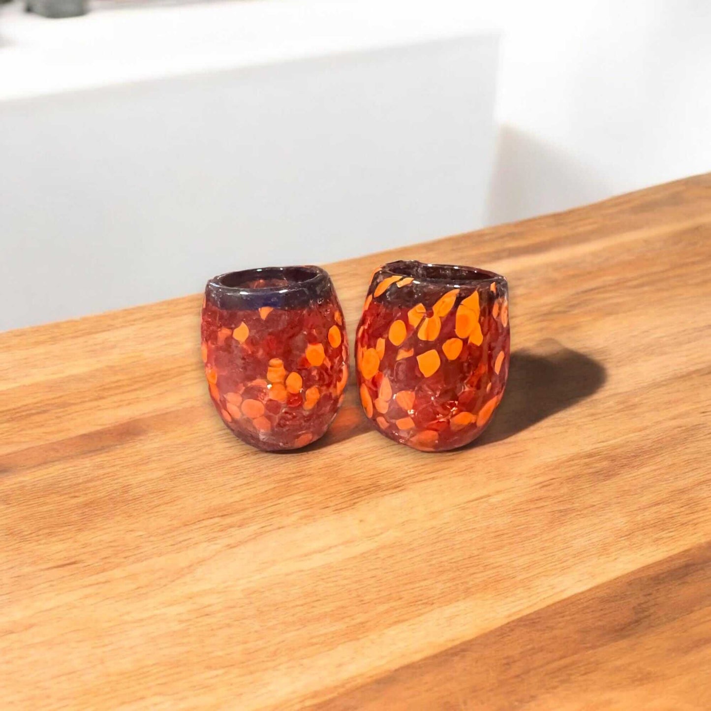 Mexican Artisan Shot Glass | Handmade Lava Design Ceramic hand-blown lead-free glass lava pattern pair on wooden table