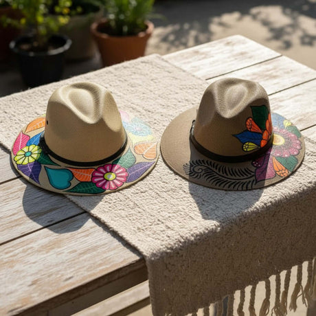 The Talavera Hub hand-painted Mexican sombrero with vibrant floral designs. Straw hat with colorful art.