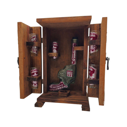 Open revolver decanter display box with six shot glasses on a white background