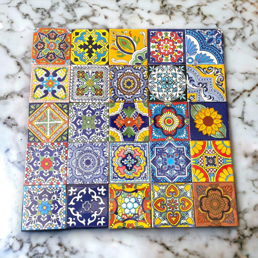 Mexican Talavera 4" Ceramic Tiles | Box of 90 Wholesale - colorful handcrafted Talavera tile sample on marble surface