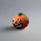 Mini Talavera Pumpkin | Handcrafted Mexican Jack-O'-Lantern - hand-painted orange ceramic jack-o'-lantern with floral accents and leaf stem