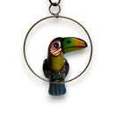 Colorful Mini Talavera Toucan | Handcrafted Hanging Decor - hand-painted talavera toucan ornament with green orange yellow beak and brass hanging ring
