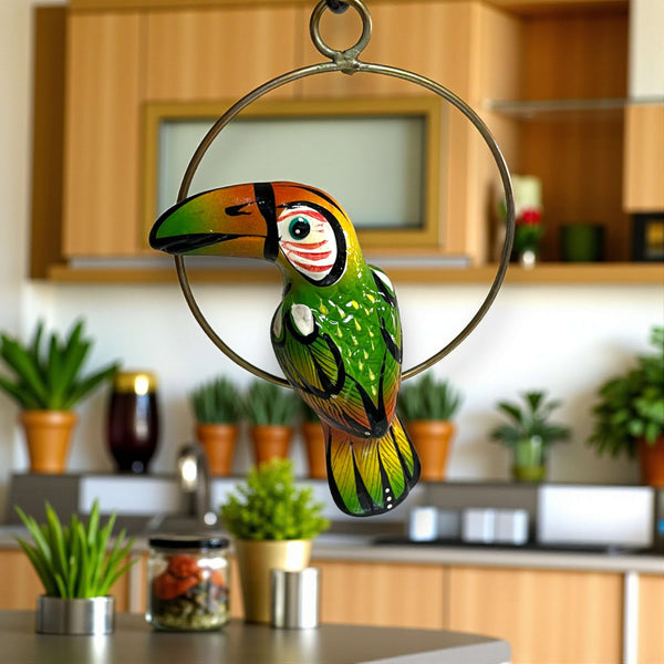 Colorful Mini Talavera Toucan | Handcrafted Hanging Decor hand-painted green and orange toucan on hanging ring in modern kitchen