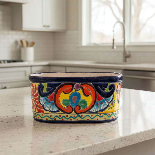 Oval Blue Rim Talavera Planter | Handcrafted Mexican Pot on kitchen counter, hand-painted floral blue rim, kiln-fired lead-free glaze