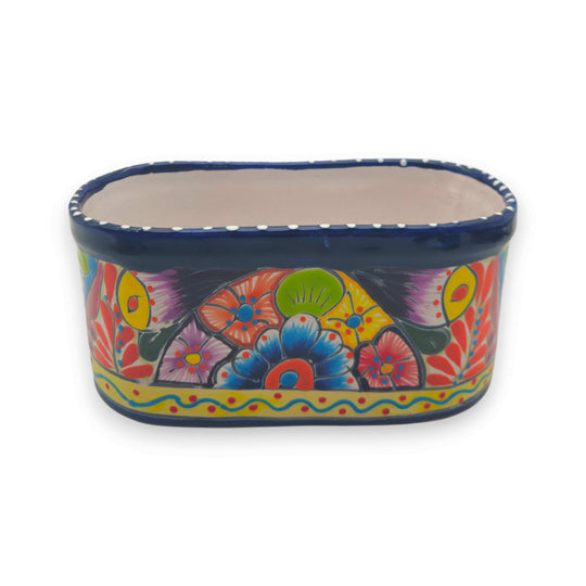 Oval Blue Rim Talavera Planter | Handcrafted Mexican Pot - hand-painted oval Talavera planter with deep blue rim and colorful floral folk design