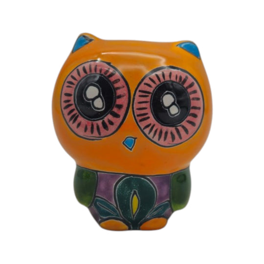 Front view of an orange Talavera owl figurine with pink eyes and colorful painted details