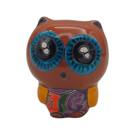 Front view of a brown Talavera owl figurine with bright blue eyes and multicolor details