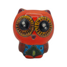 Front view of a red Talavera owl figurine with yellow eyes and colorful painted details