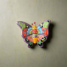 Talavera Butterfly Wall Hanging | Petite Animal Decor - hand-painted Talavera ceramic butterfly with bright multicolor wings, Mexican artisan pottery