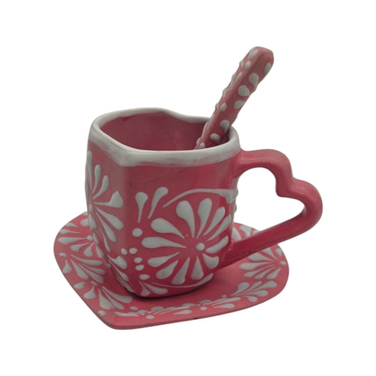 Side view of pink Talavera heart mug with matching plate and spoon