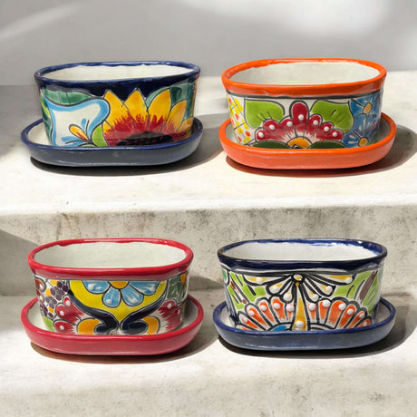 Small Talavera Flower Pot | Colorful Hand-Painted Mexican Planter showing four vibrant hand-painted Talavera planters with saucers