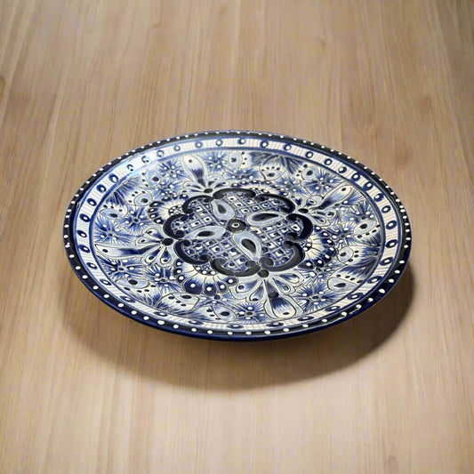 11.5" Talavera Blue & White Dinner Plate | Mexican Dinnerware - hand-painted blue and white Mexican Talavera ceramic plate on wooden table